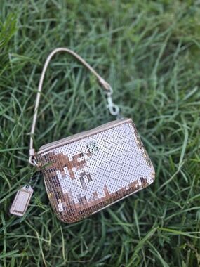 Coach Sequin Wristlet Clutch in Rose Gold